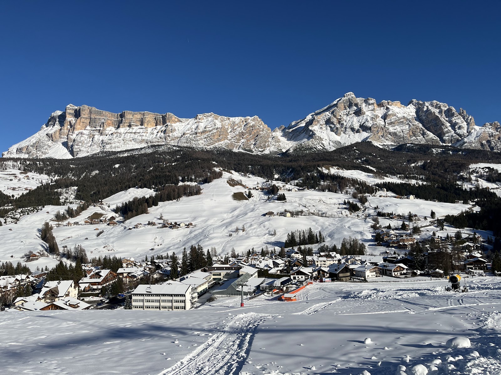 The village of Corvara below the Sassongher peak in winter