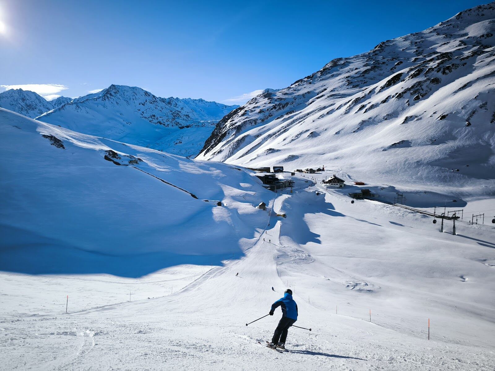 The linked SkiArena slopes toward Sedrun above Andermatt